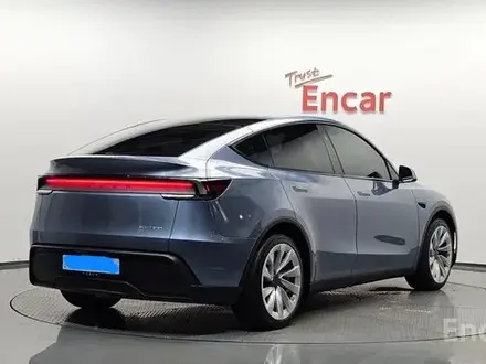 Tesla Model Y 2025 года за 26 700 000 тг. в Алматы – фото 4