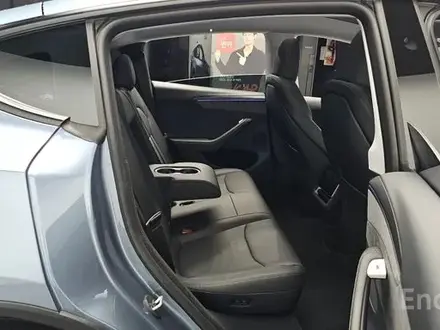Tesla Model Y 2025 года за 26 700 000 тг. в Алматы – фото 17