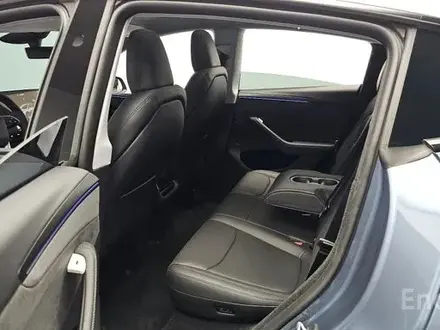 Tesla Model Y 2025 года за 26 700 000 тг. в Алматы – фото 18