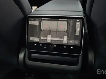 Tesla Model Y 2025 года за 26 700 000 тг. в Алматы – фото 30
