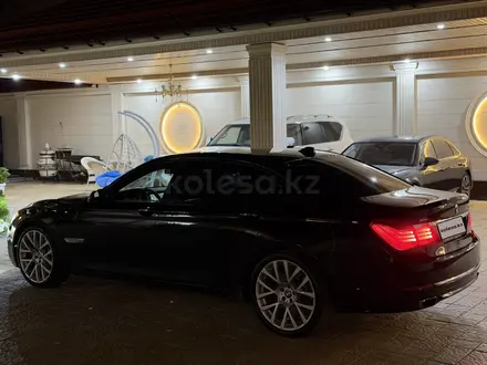 BMW 750 2012 года за 15 000 000 тг. в Алматы – фото 4