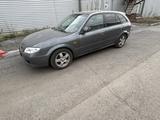 Mazda 323 2002 года за 2 000 000 тг. в Караганда – фото 2