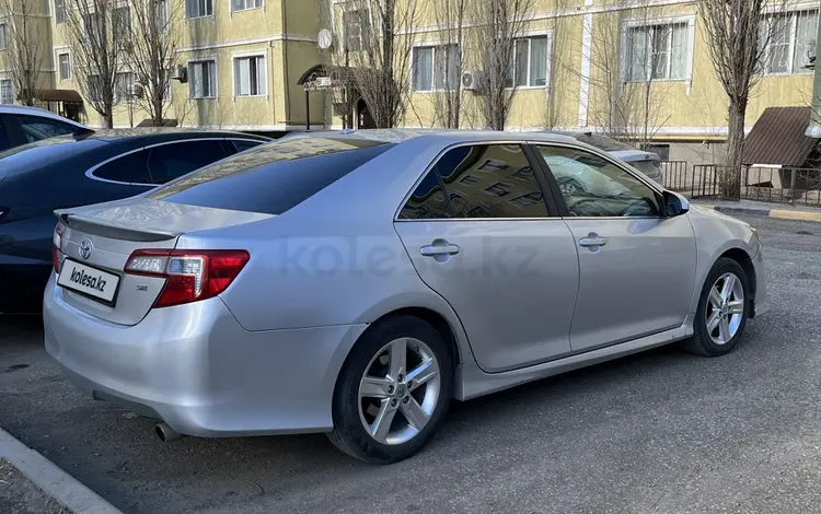 Toyota Camry 2014 года за 6 800 000 тг. в Актобе