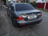 Mitsubishi Lancer 2005 года за 700 000 тг. в Уральск – фото 4