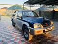 Mitsubishi L200 2002 года за 2 600 000 тг. в Алматы – фото 4