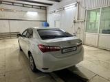 Toyota Corolla 2017 года за 10 000 000 тг. в Атырау – фото 4