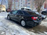 Toyota Camry 2013 года за 7 900 000 тг. в Аксай – фото 2