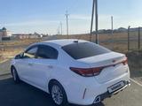 Kia Rio 2021 года за 6 800 000 тг. в Атырау – фото 3