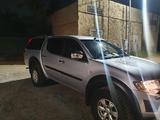 Mitsubishi L200 2012 года за 6 543 210 тг. в Алматы