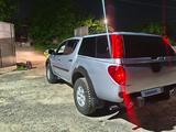 Mitsubishi L200 2012 года за 6 543 210 тг. в Алматы – фото 5