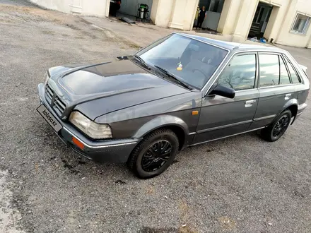 Mazda 323 1988 года за 1 800 000 тг. в Караганда – фото 4