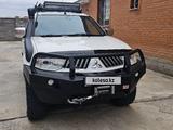 Mitsubishi Pajero Sport 2012 года за 11 000 000 тг. в Астана – фото 2