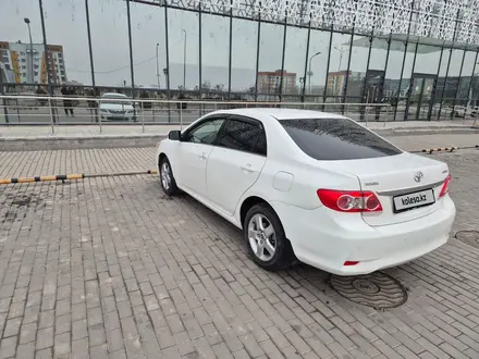 Toyota Corolla 2012 года за 7 500 000 тг. в Туркестан – фото 16