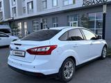 Ford Focus 2013 года за 2 900 000 тг. в Астана – фото 3