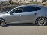 Kia K7 2021 года за 13 000 000 тг. в Алматы – фото 2