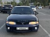 Mitsubishi Carisma 1996 годаүшін1 400 000 тг. в Алматы