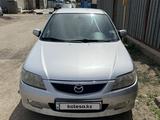 Mazda 323 2002 годаүшін2 700 000 тг. в Жезказган – фото 2