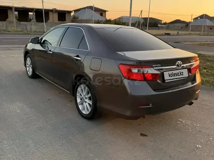 Toyota Camry 2012 года за 9 500 000 тг. в Шымкент – фото 18
