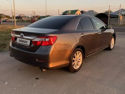 Toyota Camry 2012 года за 9 500 000 тг. в Шымкент – фото 19