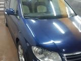 Volkswagen Touran 2009 года за 3 900 000 тг. в Астана