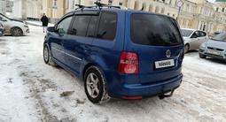 Volkswagen Touran 2008 годаүшін3 400 000 тг. в Костанай