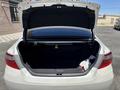 Toyota Camry 2015 года за 7 500 000 тг. в Жанаозен – фото 9