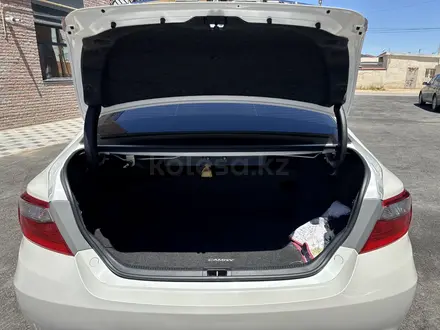 Toyota Camry 2015 года за 7 500 000 тг. в Жанаозен – фото 9