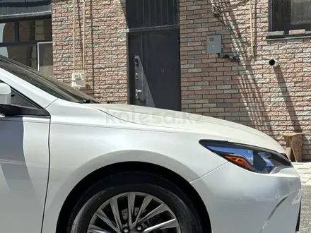 Toyota Camry 2015 года за 7 500 000 тг. в Жанаозен – фото 11