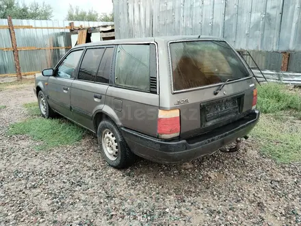 Mazda 323 1993 года за 550 000 тг. в Жетиген – фото 5