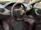 Renault Logan 2013 года за 2 200 000 тг. в Атырау – фото 5