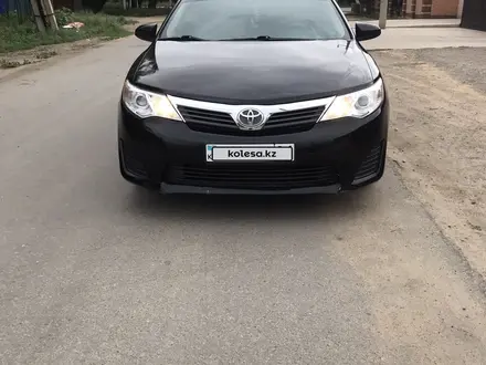 Toyota Camry 2013 года за 7 900 000 тг. в Актобе