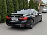 BMW 750 2017 года за 23 000 000 тг. в Алматы – фото 4