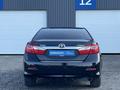 Toyota Camry 2014 года за 7 990 000 тг. в Астана – фото 4