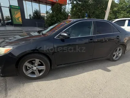 Toyota Camry 2013 года за 6 000 000 тг. в Атырау