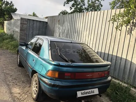 Mazda 323 1992 года за 560 000 тг. в Алматы – фото 2