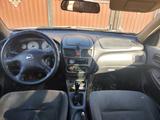 Nissan Sunny 2005 года за 2 200 000 тг. в Атырау – фото 4