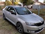Skoda Rapid 2013 года за 4 500 000 тг. в Караганда – фото 2