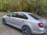 Skoda Rapid 2013 года за 4 500 000 тг. в Караганда – фото 3