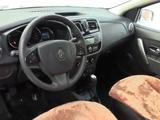 Renault Logan 2015 года за 4 300 000 тг. в Уральск – фото 2