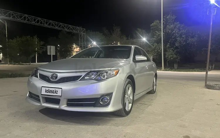 Toyota Camry 2014 года за 5 700 000 тг. в Жанаозен