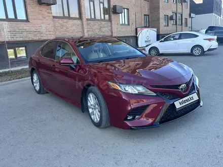 Toyota Camry 2019 года за 12 500 000 тг. в Актобе – фото 14