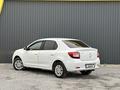 Renault Logan 2014 года за 2 700 000 тг. в Актобе – фото 3