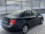 Chevrolet Aveo 2014 года за 3 400 000 тг. в Караганда – фото 3