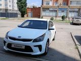 Kia Rio 2018 года за 4 900 000 тг. в Актобе – фото 2