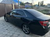 Toyota Camry 2013 года за 7 600 000 тг. в Актобе – фото 5