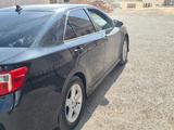 Toyota Camry 2015 года за 8 500 000 тг. в Жанаозен – фото 3