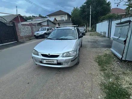 Mazda 323 1999 года за 2 100 000 тг. в Алматы – фото 4