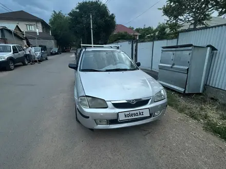 Mazda 323 1999 года за 2 100 000 тг. в Алматы – фото 5