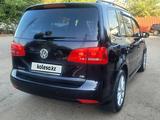 Volkswagen Touran 2010 года за 5 500 000 тг. в Алматы – фото 2