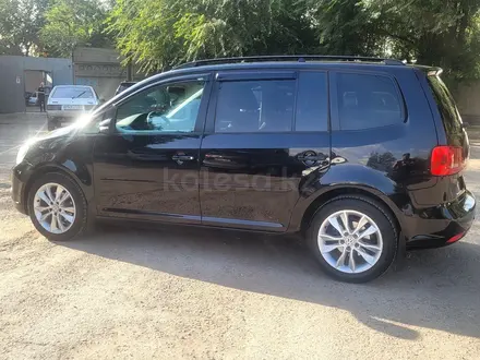 Volkswagen Touran 2010 года за 5 500 000 тг. в Алматы – фото 32